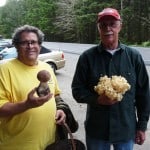 Joseph with a Porcini mushroom, Glen with a Cauliflower mushroom