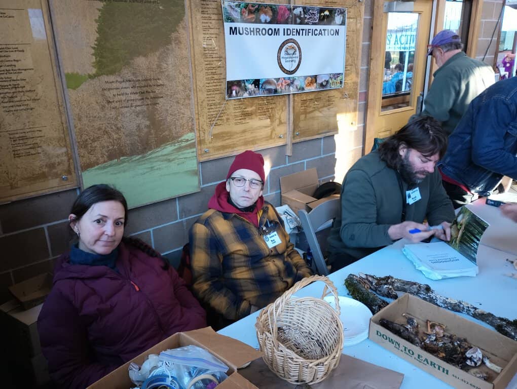 Susie, Ron, and Noah at the Expert ID table